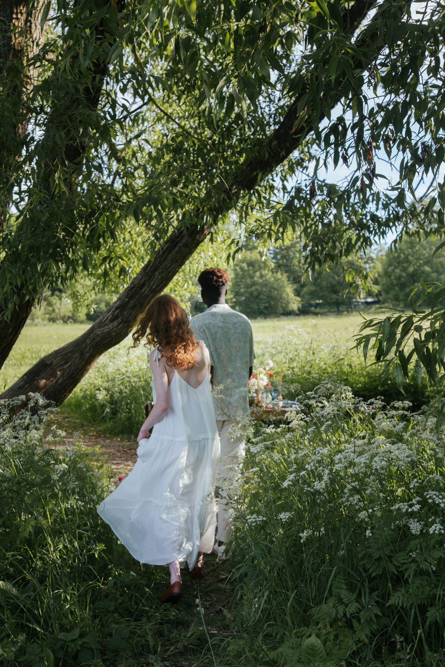 A couple walking in the farm