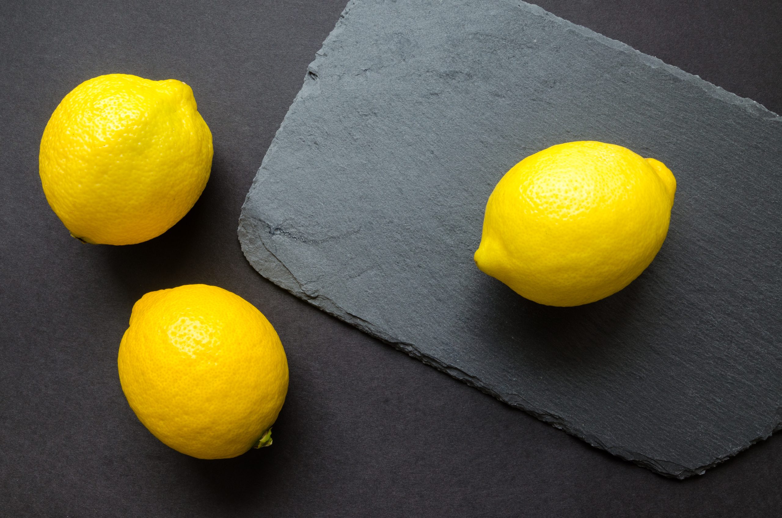 Three yellow citrus